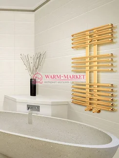 Sahara gold - золотой полотенцесушитель с закругленными перекладинами.