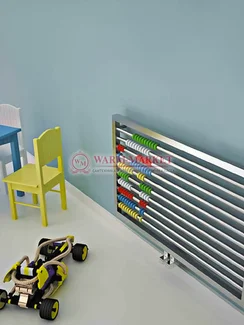 Дизайнерский полотенцесушитель из матовой полированной нержавеющей стали Abako Carisa