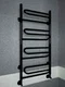 Upiter E - электрический полотенцесушитель с увеличенным пространством для сушки черного цвета.