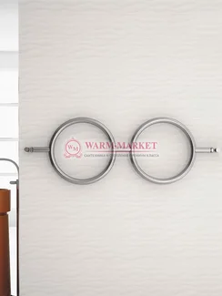 Дизайнерский полотенцесушитель из матовой полированной нержавеющей стали Roni Carisa