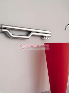 Дизайнерский полотенцесушитель из матовой полированной нержавеющей стали Redox Carisa